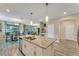 Spacious kitchen with granite countertops and island at 1592 Flange Dr, Davenport, FL 33896