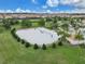 Sand volleyball court with surrounding landscaping in a community setting at 1592 Flange Dr, Davenport, FL 33896
