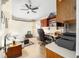 Home office with built-in desk and cabinets at 8457 Se 177Th Penman Pl, The Villages, FL 32162