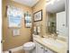 Clean bathroom with single vanity and shower/tub combo at 8457 Se 177Th Penman Pl, The Villages, FL 32162