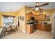Charming kitchen with breakfast nook and lots of natural light at 8457 Se 177Th Penman Pl, The Villages, FL 32162