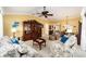 Spacious living room with ample natural light and comfortable furnishings at 8457 Se 177Th Penman Pl, The Villages, FL 32162