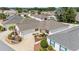 Aerial view of house and surrounding neighborhood at 8457 Se 177Th Penman Pl, The Villages, FL 32162