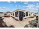 Spacious backyard with patio, fountain, and grill at 8457 Se 177Th Penman Pl, The Villages, FL 32162