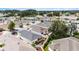 An aerial view showcasing a home's private backyard and surrounding neighborhood at 8457 Se 177Th Penman Pl, The Villages, FL 32162
