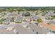 Aerial view showcasing a home's curb appeal and surrounding neighborhood at 8457 Se 177Th Penman Pl, The Villages, FL 32162