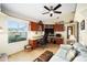Bright home office with built-in desk and window view at 8457 Se 177Th Penman Pl, The Villages, FL 32162