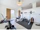Home gym with exercise bike and weightlifting equipment at 275 Cr 552, Bushnell, FL 33513