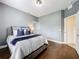 Spacious bedroom featuring wood floors and neutral decor at 275 Cr 552, Bushnell, FL 33513