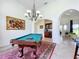 Game room featuring a pool table, wet bar, and ample space for entertainment at 275 Cr 552, Bushnell, FL 33513