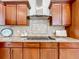 Modern kitchen with granite countertops and a gas cooktop at 275 Cr 552, Bushnell, FL 33513