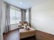 Cozy sitting area with comfortable chair and ottoman, near patio access at 275 Cr 552, Bushnell, FL 33513