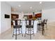 Modern kitchen island with seating for three at 275 Cr 552, Bushnell, FL 33513