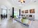 Spacious living room featuring a comfortable sofa and large windows at 275 Cr 552, Bushnell, FL 33513