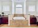 Spa-like bathroom with a large soaking tub and separate shower at 275 Cr 552, Bushnell, FL 33513