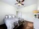 Peaceful bedroom with wood floors, ceiling fan and window at 275 Cr 552, Bushnell, FL 33513