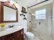 Elegant bathroom with a walk-in shower and updated vanity at 275 Cr 552, Bushnell, FL 33513