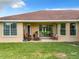Covered patio with seating area, great for outdoor relaxation at 275 Cr 552, Bushnell, FL 33513