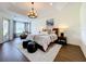 Main bedroom with king-size bed and sitting area at 275 Cr 552, Bushnell, FL 33513