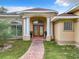 Elegant entrance with double doors and brick pathway at 275 Cr 552, Bushnell, FL 33513