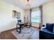 Home office with wood floors, large window, and stylish rug at 275 Cr 552, Bushnell, FL 33513