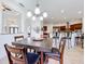 Breakfast nook with a table and chairs, view into kitchen and Gathering room at 275 Cr 552, Bushnell, FL 33513