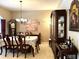 Formal dining room with a large table and hutch at 2277 Calvert Ct, Clermont, FL 34711