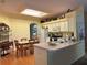 Galley kitchen with island and breakfast area at 2277 Calvert Ct, Clermont, FL 34711