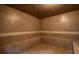 Clean and modern steam room with tiled walls and seating at 2277 Calvert Ct, Clermont, FL 34711