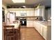 Well-equipped kitchen with ample cabinetry and breakfast nook at 2277 Calvert Ct, Clermont, FL 34711