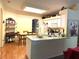 Galley kitchen with island and breakfast area at 2277 Calvert Ct, Clermont, FL 34711