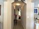 Elegant hallway with decorative accents, leading to other rooms of the house at 2277 Calvert Ct, Clermont, FL 34711