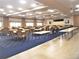 Spacious banquet hall with numerous tables and chairs at 2277 Calvert Ct, Clermont, FL 34711