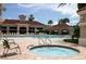 Community pool and spa with ample lounge chairs at 2277 Calvert Ct, Clermont, FL 34711
