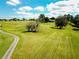 Picturesque golf course with lush green fairways and mature trees at 2277 Calvert Ct, Clermont, FL 34711