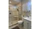 Clean bathroom with a walk-in shower and updated vanity at 11136 Bronson Rd, Clermont, FL 34711