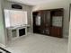 Dining area with built-in hutch and fireplace at 11136 Bronson Rd, Clermont, FL 34711