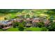 Aerial view of community with golf course and resort-style amenities at 15607 Vetta Dr, Montverde, FL 34756