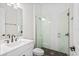 Bathroom with white subway tiles and a glass shower at 15607 Vetta Dr, Montverde, FL 34756