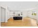 Modern kitchen with white cabinets, an island, and stainless steel appliances at 15607 Vetta Dr, Montverde, FL 34756