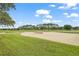 Sand trap and green on a sunny golf course at 9323 San Jose Blvd, Howey In The Hills, FL 34737