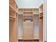 Large walk-in closet with ample shelving and hanging space at 9323 San Jose Blvd, Howey In The Hills, FL 34737