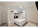 Bedroom with built-in bunk bed and ceiling fan at 74 Polermo Ave, Saint Cloud, FL 34771