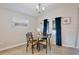 Cozy dining area with four chairs and marble table at 74 Polermo Ave, Saint Cloud, FL 34771