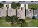 Aerial view of houses in a neighborhood near a golf course at 24215 Belle Mede Dr, Leesburg, FL 34748