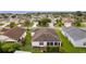 Community overview showcasing house and neighborhood at 2403 Carriage Hill Way, The Villages, FL 32162