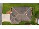 Overhead view of single-Gathering home with driveway and lawn at 2403 Carriage Hill Way, The Villages, FL 32162