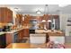 Kitchen with stainless steel appliances and an island at 2403 Carriage Hill Way, The Villages, FL 32162