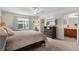 Spacious main bedroom with en-suite bathroom access at 2403 Carriage Hill Way, The Villages, FL 32162