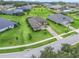 Aerial view of a house in a residential neighborhood at 5159 Greens Dr, Lady Lake, FL 32159